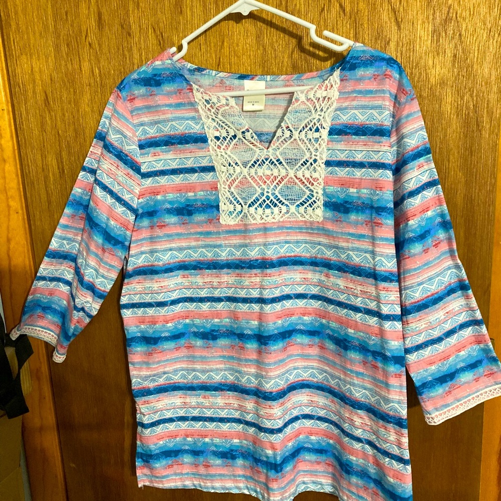 Beautiful 3/4 sleeve top. Soft fabric. Machine wash and dry